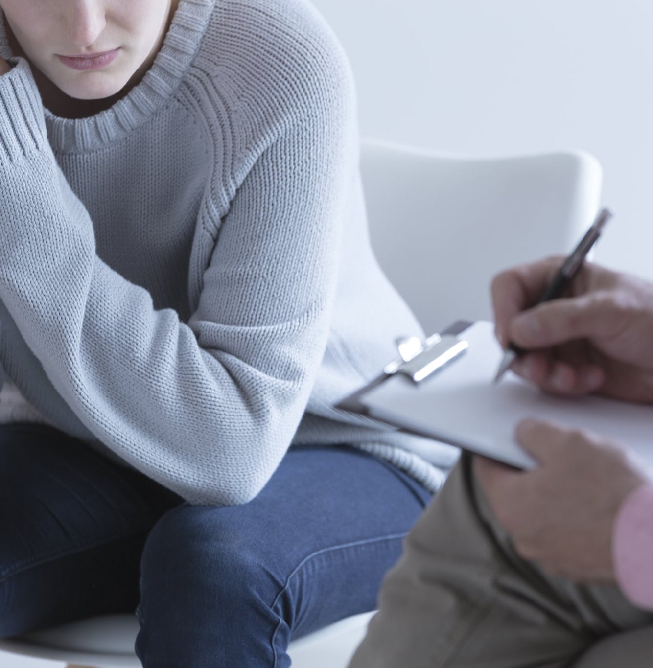Photo of a sad woman in therapy